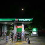 green and white gas station